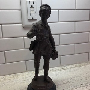 19th century bronzed spelter figurine / schoolboy with books / 10&quot; tall / very good condition