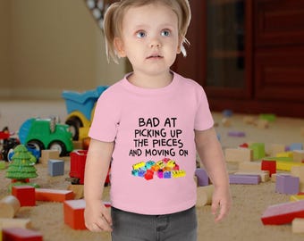Funny Building Block Kids T-Shirt – Soft Cotton Graphic Tee for Boys Girls – Bad at Picking Up the Pieces Shirt – Playful Youth Gift Idea