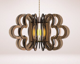 May include: A wooden pendant light fixture with a geometric design. The light fixture is made of multiple layers of wood that are cut into a flower shape. The light fixture is hanging from a cord and has a light bulb inside.