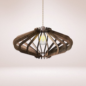 May include: A wooden pendant light fitting with a geometric design. The light fitting is suspended from a cord and has a single light bulb.