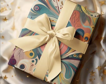 Peut inclure: Un coffret cadeau emballé avec un ruban et un nœud en satin crème. Le papier d'emballage présente un motif abstrait coloré avec des tourbillons de bleu sarcelle, de rose et d'orange. Le cadeau est présenté sur une surface en satin blanc avec des confettis dorés en forme d'étoiles.