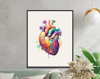 May include: A framed print featuring a colorful, watercolor-style illustration of a human heart. The artwork showcases a vibrant spectrum of colors, including red, yellow, blue, and green, with detailed anatomical features. The heart is set against a neutral background.