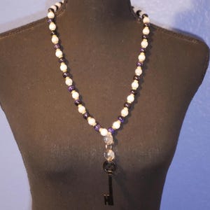 Clé de collier en corail