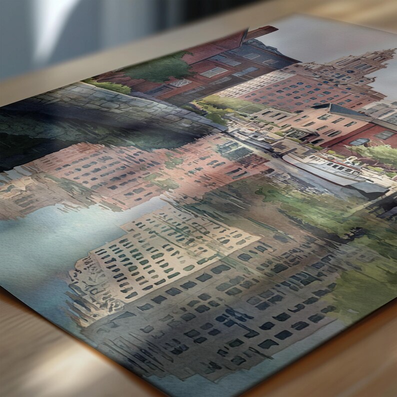 May include: Watercolor painting of a city waterfront scene with buildings and boats. The buildings are reflected in the water, creating a symmetrical composition. The color palette includes shades of red, brown, and blue.
