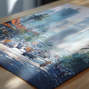 May include: Watercolor painting of a city street scene with tall buildings, palm trees, and traffic. The artwork features a palette of blues, oranges, and grays, with a focus on light and shadow. The image is printed on a rectangular canvas.