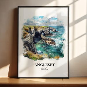 May include: A watercolor painting of a rocky coastline with a natural archway. The water is a vibrant blue and green, and the sky is a light blue with white clouds. The text "Anglesey, Wales" is printed at the bottom of the painting.