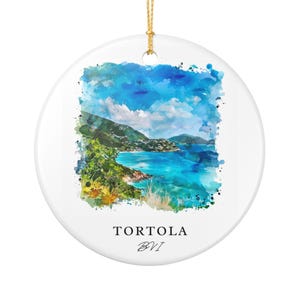 May include: A white ceramic ornament with a watercolor painting of Tortola, BVI. The artwork depicts a coastal scene with turquoise water, green hills, and a blue sky with clouds. The text "TORTOLA BVI" is printed below the image.