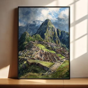 May include: A framed watercolor print of Machu Picchu, showcasing the ancient Inca citadel nestled in the Andes Mountains. The artwork features lush green mountains, stone structures, and a cloudy sky, all within a black frame.