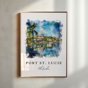 May include: Watercolor painting of a waterfront scene in Port St. Lucie, Florida. The painting features a palm tree, houses, a canal, and a blue sky with clouds.