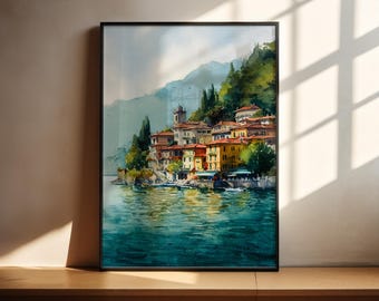 May include: Watercolor painting of a lakeside village with colorful buildings and a church tower. The artwork features a vibrant blue lake, green hills, and a black frame. The painting is displayed on a wooden surface.