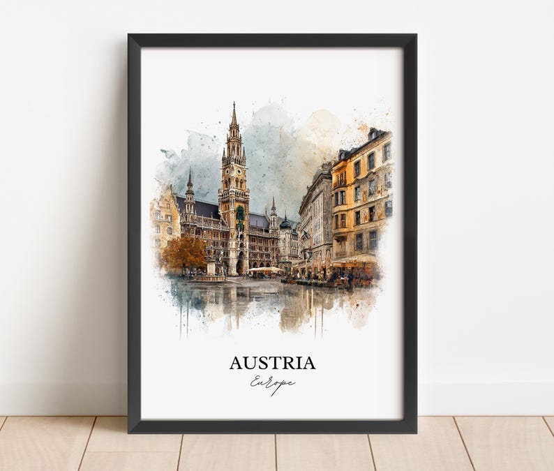 May include: A framed watercolour print depicting a European city, with a prominent clock tower and surrounding buildings. The print is in a black frame, with the words "AUSTRIA" and "Europe" printed at the bottom.