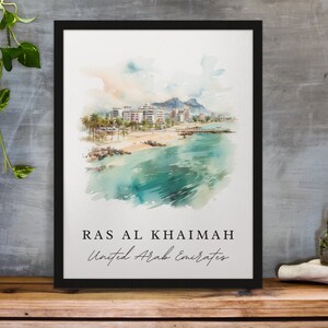 May include: A watercolor painting of a cityscape with buildings and a beach. The painting is in shades of blue, green, and brown. The text "RAS AL KHAIMAH United Arab Emirates" is written below the painting.