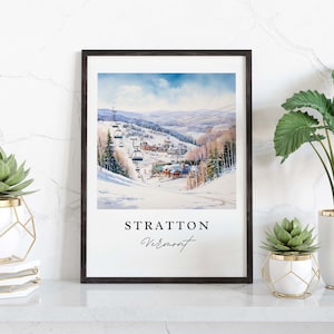 May include: A watercolor painting of a ski resort in Stratton, Vermont. The painting shows a ski lift with people riding up the mountain, and a view of the town below. The painting is framed in a black frame.