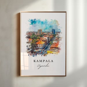 May include: A watercolor painting of Kampala, Uganda. The painting shows a cityscape with buildings, streets, and trees. The painting is framed in a gold frame.