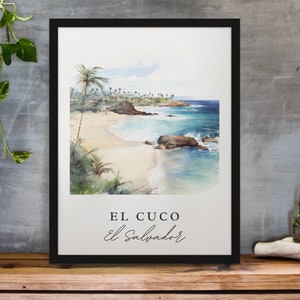 May include: A framed watercolor painting of a beach scene with palm trees, turquoise water, and a sandy shore. The text "EL CUCO El Salvador" is printed below the image.