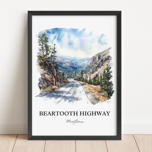 May include: Watercolor painting of a winding road through a mountain pass with trees and a blue sky. The text "Beartooth Highway Montana" is at the bottom of the image.