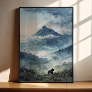 May include: Framed art print featuring a gorilla in a misty mountain landscape. The artwork showcases a gorilla in the foreground, with a mountain peak and clouds in the background. The color palette includes shades of blue, green, and gray.