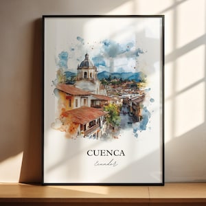 May include: Watercolor print of Cuenca, Ecuador, in a black frame. The artwork depicts a cityscape with a church and buildings with red-tiled roofs. The text "CUENCA Ecuador" is at the bottom of the print, with a watercolor effect.
