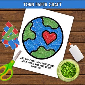 May include: A torn paper craft project featuring a circular earth design made of blue and green paper pieces with a red heart in the centre. The text reads: GOD SAW EVERYTHING THAT HE HAD MADE AND IT WAS VERY GOOD GENESIS 1:31. Includes scissors, glue, and glitter.