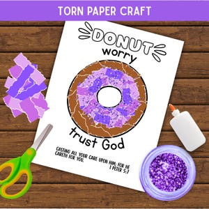 May include: A torn paper craft activity sheet featuring a donut illustration with purple paper pieces, the text DONUT worry trust God, and the verse 1 PETER 5:7. Includes a pair of green scissors, a white glue bottle, and purple glitter.