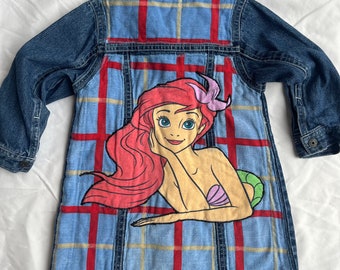 Upcycled vintage denim dress with added flannel and little mermaid graphic