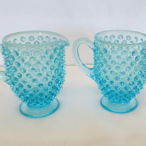 Fenton glass blue opalescent hobnail sugar and creamer set