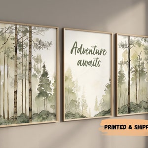 May include: Set of three framed watercolor prints featuring a misty forest scene with the text "Adventure awaits" on the middle print.