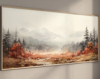 May include: A watercolor painting of a misty forest scene with a lake in the foreground. The trees are mostly evergreens, with some deciduous trees in the foreground that have red and orange leaves. The mountains in the background are covered in fog.