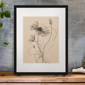 以下が含まれることがあります： シンプルなフレームの中に描かれた、白黒の線画の宇宙の花。花は繊細で、薄い茶色の背景になっています。