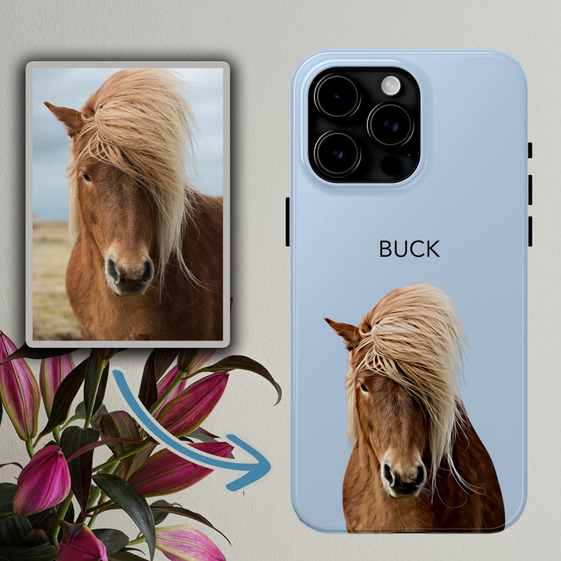 May include: A light blue iPhone case featuring a brown horse illustration and the word "BUCK" printed on the back.