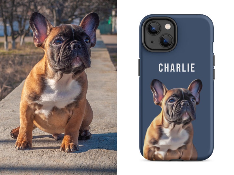 May include: A brown and black French Bulldog puppy sitting outdoors. The dog has a white chest and a black muzzle. A phone case with a navy blue background features a portrait of the dog and the name "CHARLIE" in white.