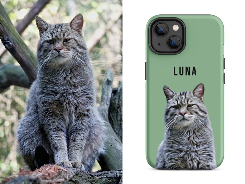 May include: A gray and brown tabby cat perched on a tree branch, with a matching phone case featuring the cat's portrait and the name "LUNA" in black letters on a green background. The cat has a serious expression.