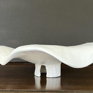 Unique handmade white ceramic bowl with undulating wavy bowl. White earthenware clay with matt white glaze. 7.5&quot; wide, 2.5&quot; high.
