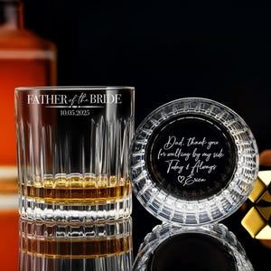May include: A set of two engraved glass gifts for a wedding. The larger glass is a rocks glass with the text "Father of the Bride 10.05.2025" etched on the side. The smaller glass is a round coaster with the text "Dad, thank you for walking by my side Today & Always Erica" etched on the bottom.