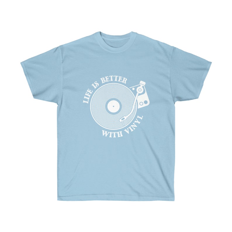 Light blue t-shirt with an intricate turntable graphic, celebrating the nostalgia of vinyl records and music.