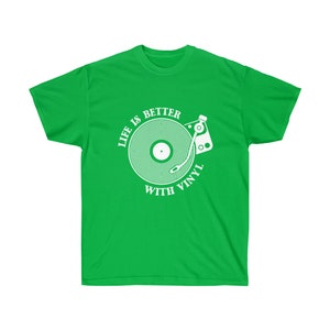 Green music t-shirt showcasing a vintage turntable design, ideal for those who love vinyl records and oldies tunes.