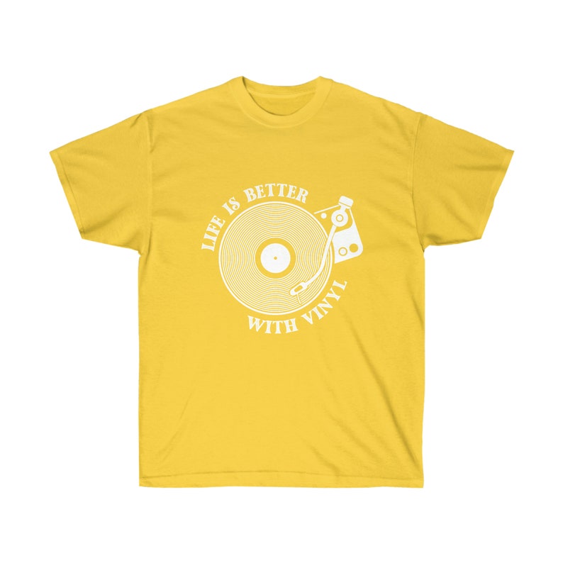 Vibrant yellow t-shirt featuring a turntable design, representing the passion for oldies music and vinyl records.