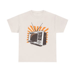 Sand colored t-shirt with vintage television set print, perfect for media history fans