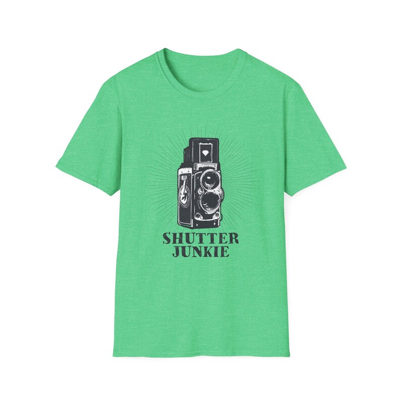 Green t-shirt with a vintage camera graphic and "Shutter Junkie" text.