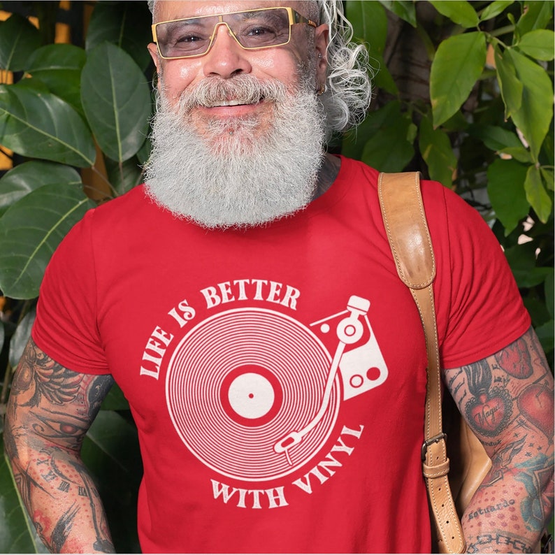 Red t-shirt with vinyl record and player design.