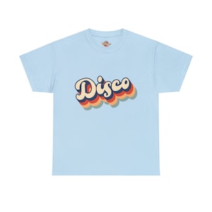 Light blue t-shirt displaying the 'Disco' design, giving a cool and calm backdrop to the lively print.