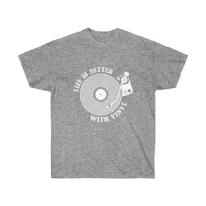 Grey t-shirt featuring a detailed vinyl record player design, perfect for DJs, collectors, and music lovers.