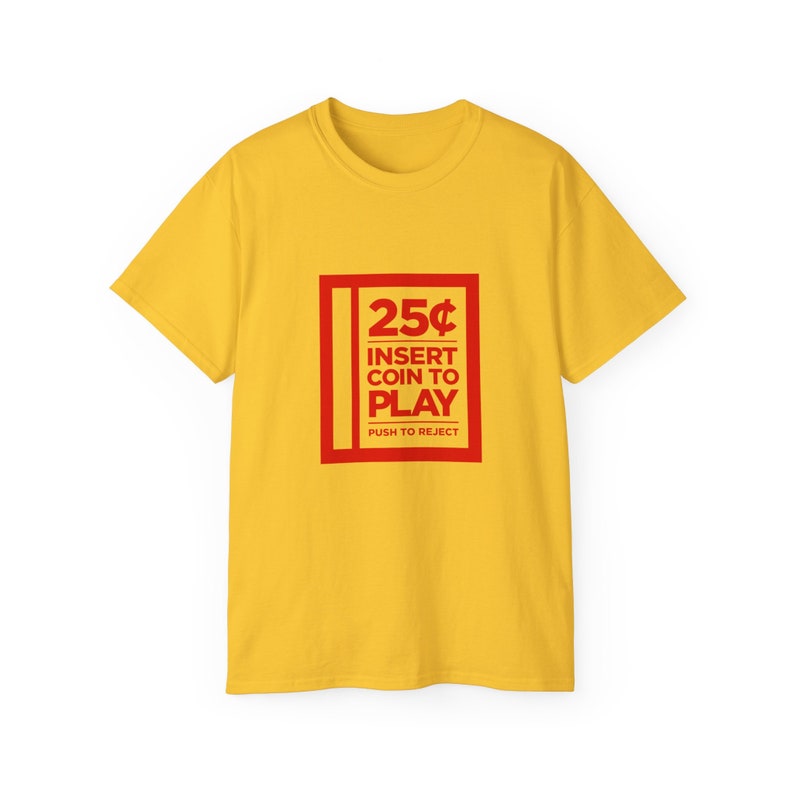 Unisex black gaming tee featuring classic arcade design with coin slot graphic and retro gaming text, ideal for arcade lovers.