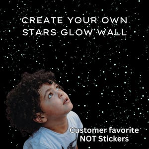 May include: A young person gazes upward at a starry night sky, with the text "CREATE YOUR OWN STARS GLOW WALL" and "Customer favorite NOT Stickers" in white. The background is black with white dots.