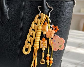 Kawaii Baking Themed Bag Charm - Chunky Yellow Knotted Keychain - Smiley Flower & Cookie Tote Accessory - Y2K Foodie Bag Strap