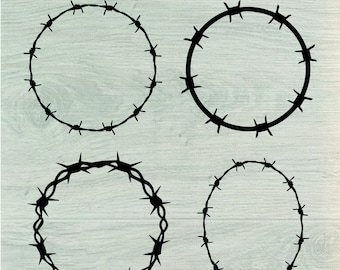 Puede incluir: Cuatro coronas de alambre de púas negras, dos redondas y dos ovaladas, sobre un fondo de madera clara.
