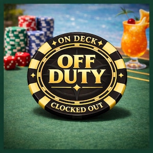 May include: A casino chip with the words "ON DECK", "OFF DUTY", and "CLOCKED OUT" in gold lettering. The chip is black with gold and yellow accents, and is set on a green surface. Other casino items are in the background, including dice, chips, and a cocktail.