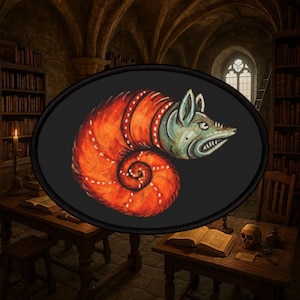 May include: An oval patch featuring a stylized creature with an orange, spiraling body and a green head. The creature has a fox-like face and is set against a black background. The patch is likely for clothing or accessories.