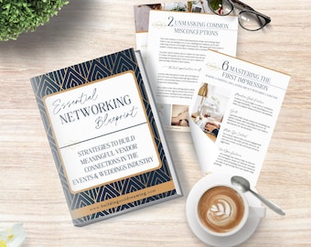 May include: A book titled "Essential Networking Blueprint" with gold and navy blue geometric design. The book is open to pages with text and images. A cup of coffee, eyeglasses, and a small plant are also on the wooden surface.