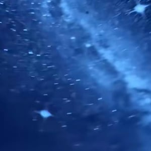May include: A galaxy night light projector displaying a blue and white nebula effect with scattered stars on a surface. The screen displays the text: Now she'll never want to leave your room... and Shop 2-in-1 Galaxy Projector Night.
